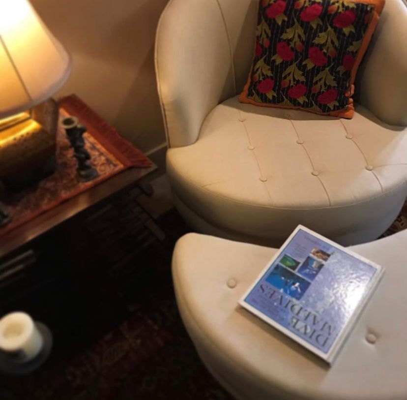 White Swivel Chair With Ottoman